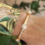 Sparkly clear crystals bangle in Gold Tone
