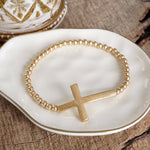 Minimal Cross Stretchy Bracelet in Worn Gold tone with Ball Beads