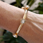 Sparkly clear crystals bangle in Gold Tone