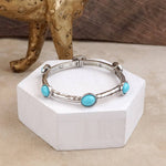 Desert Orbit – Turquoise Station Stretch Bangle: Silver Tone